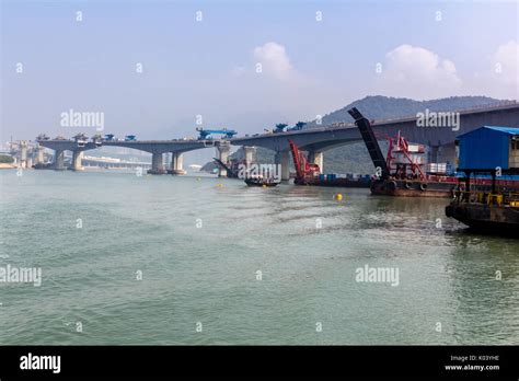 Hong Kong–Zhuhai–Macau Bridge ongoing construction project consisting ...