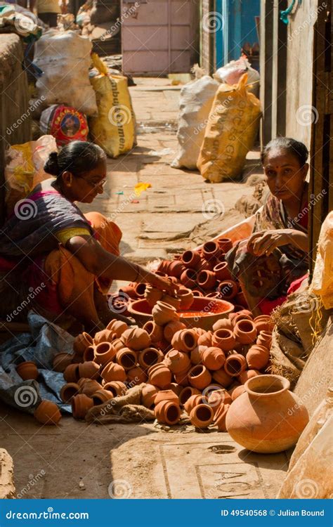 Two Woman Pottery Workers Of The Dharavi Slums In Mumbai India Editorial Image | CartoonDealer ...