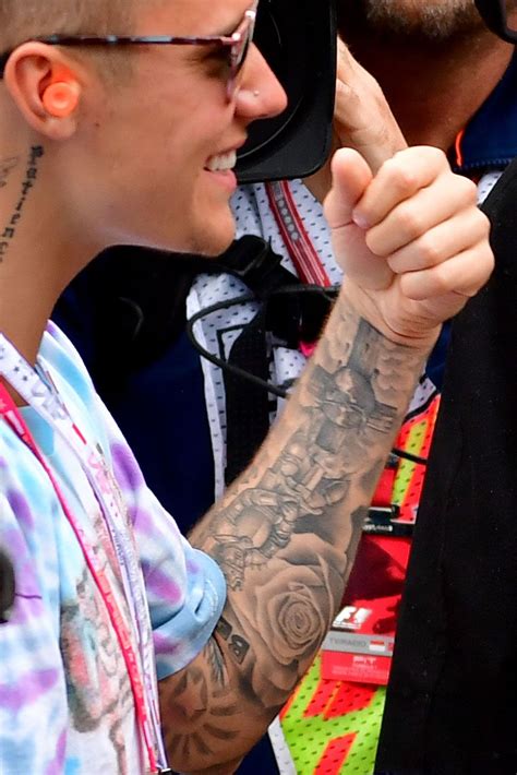 A Complete Guide to All 56 of Justin Biebers Tattoos