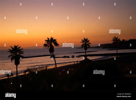 Sunset on Tenerife beach Stock Photo - Alamy