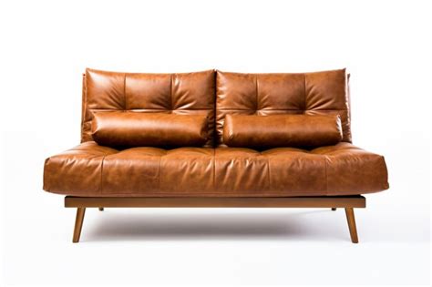 Premium AI Image | a brown leather couch with pillows on it