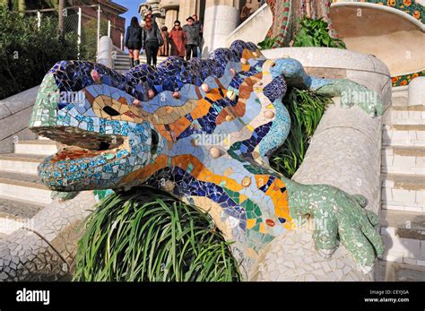 Barcelona, Spain. Park Guell (Antoni Gaudi, 1914) Mosaic lizard on Staircase leading up to the ...