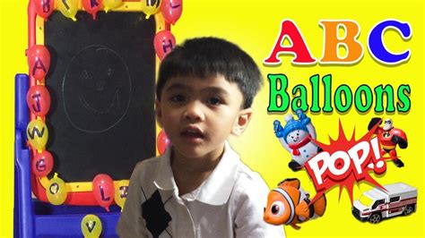 Learning ABC Phonics Popping a Ballons game using Toys - YouTube