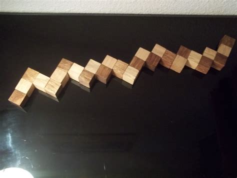 Casse-tête : le snake cube 3x3x3 en bois et sa solution – Le blog de ...