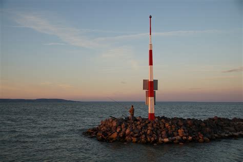 Lake,balaton,sunset,fisherman,lighthouse - free image from needpix.com