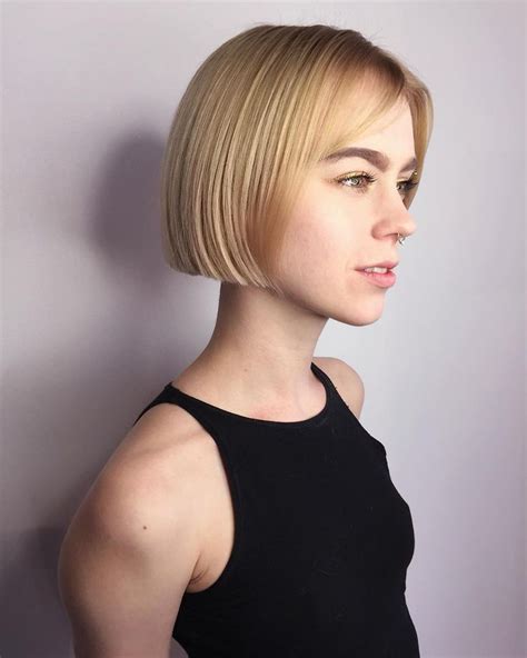 This Short Blonde Blunt Bob with Parted Bangs is a great modern ...