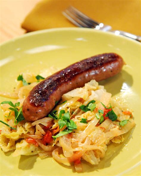 Beer-Braised Bratwurst with Cabbage Recipe & Video | Martha Stewart