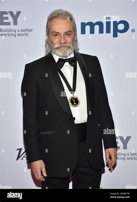 Haluk Bilginer arrives at the 47th International Emmy Awards gala at the Hilton Hotel on Monday ...