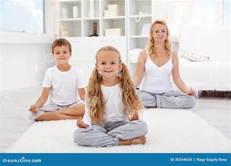 Kids Doing Yoga Relaxing Exercise Stock Photo - Image of group, relax ...