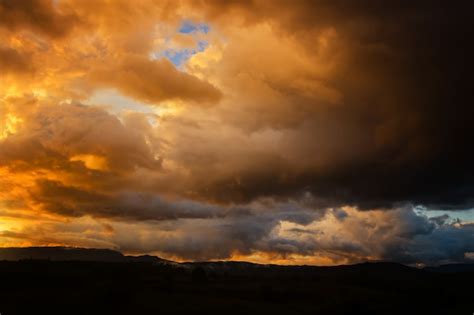 Premium Photo | Dark storm clouds before rain at sunset. cloud on sunse