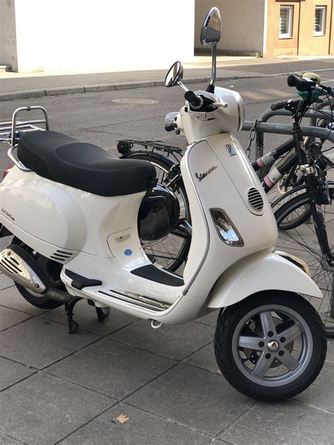 Another white Vespa in Stuttgart | Vespa s, Vespa, Motorcycle