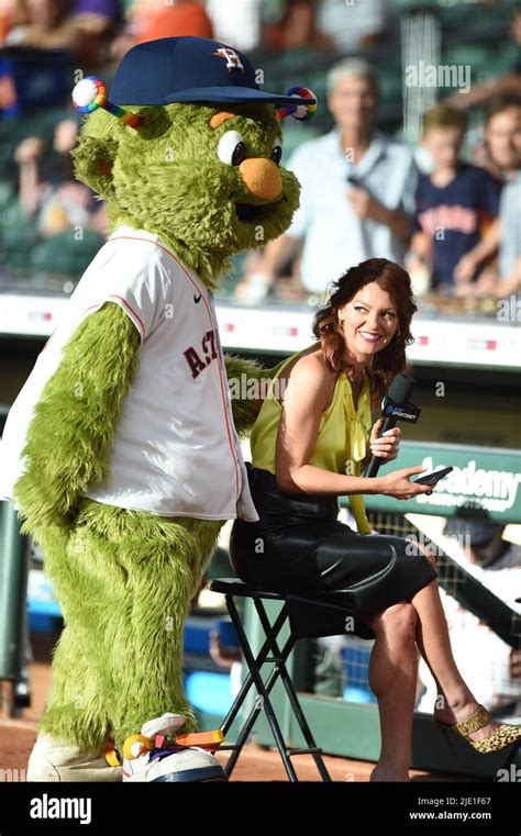 Houston Astros mascot Orbit has some fun with Julia Morales before the MLB game between the ...