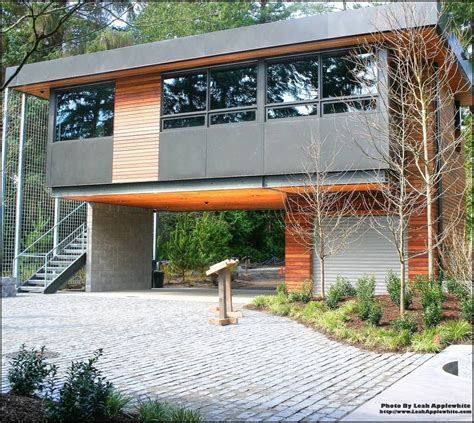 Contemporary Garages | House on stilts, Modern house on stilts, Modern ...