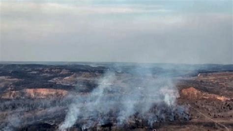 At least two dead as largest wildfire in state history tears through ...