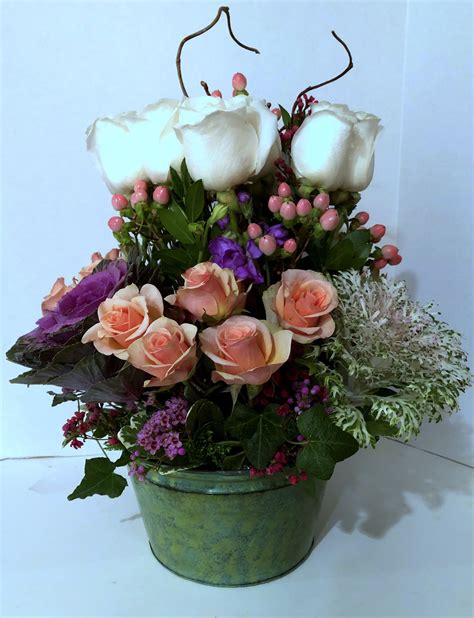 Tiered roses w ornamental Kale & Hypericom berry. | Ny florist ...