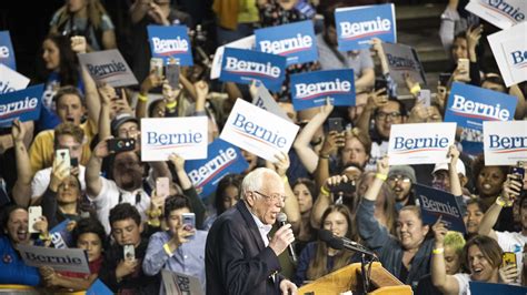 Sanders campaign condemns Nazi swastika flag flown by protester at rally