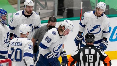 Lightning’s Mikhail Sergachev takes errant puck to face in stride