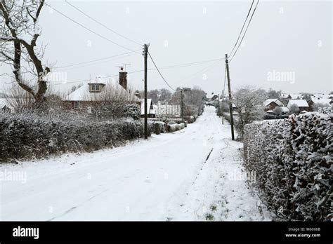 Ashford, Kent. 27th Feb, 2018. UK Weather. Snow covered country road Stock Photo: 175812179 - Alamy