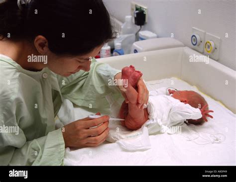 Changing a baby s nappies Stock Photo - Alamy