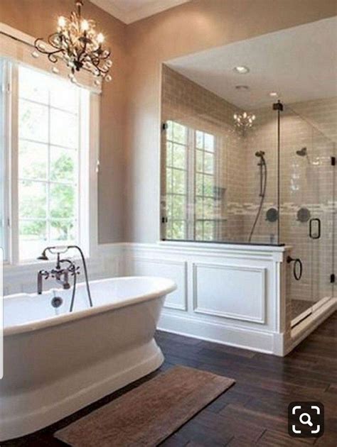 Love this elegant, spacious, simple, warm bathroom design. Shower is a ...