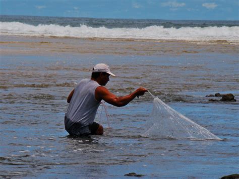 Tamarindo, Costa Rica Daily Photo: Pulling in the fishing net