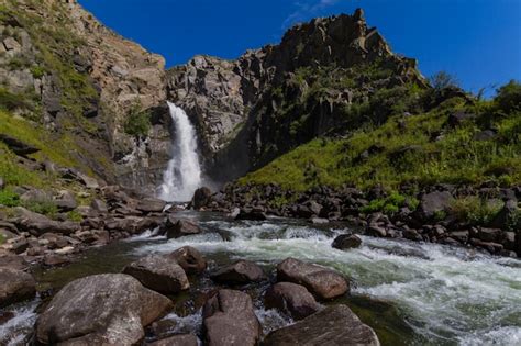 Premium Photo | Waterfall in altay mountains. beautiful nature ...