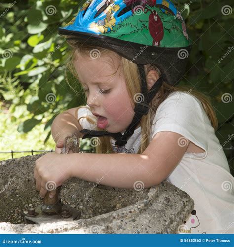 Child Drinking Water From A Fountain Stock Photo - Image: 56853863