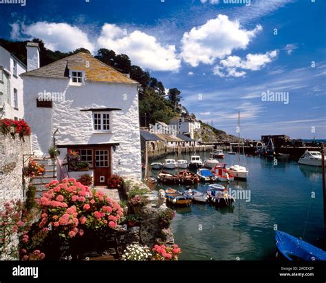 Cottages by a harbour. Photographed in Polperro, Cornwall, UK Stock ...