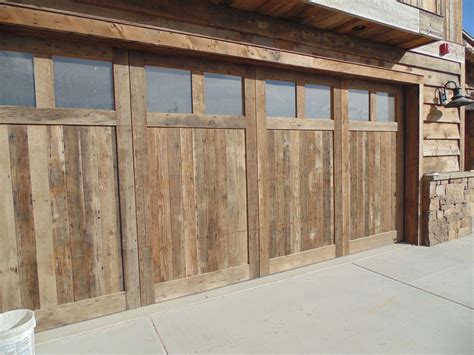 Rustic Wood Hub's barnboard create these garage doors | Wood doors interior, Residential ...