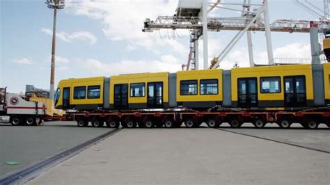 New Gold Coast tram arrives at Port of Brisbane after 26,000km trip ...