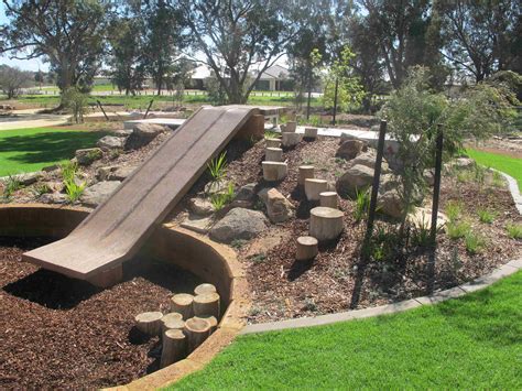 natural playscape with slide | Playscape Ideas