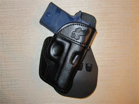 ITEM # 254 - SIG SAUER P938, PADDLE HOLSTER,FORMED LEATHER OWB HOLSTER RIGHT HAND