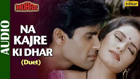 Na Kajre Ki Dhar Lyrics – Mohra Movie Song | Hot Star Verse