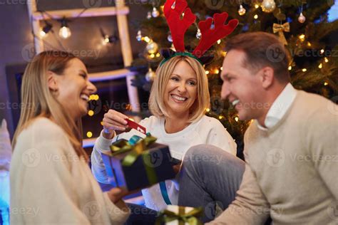 Friends or family celebrating christmas party 15894028 Stock Photo at ...