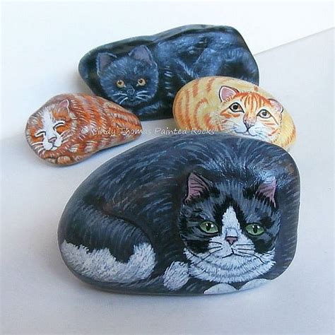 4 Cats Painted Rocks | Different styles of painted rock cats… | Cindy Thomas | Flickr