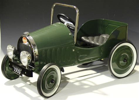 A late 20th century Baghera child's pedal car, finished in green with chromium plated mounts, o