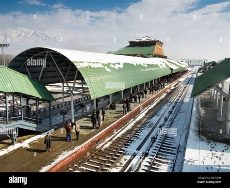 India, Kashmir, Srinagar Railway station in winter, passengers waiting ...