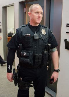 New Seattle police uniforms showing Axon Body camera by TASER | Axon Body-Worn Cameras ...