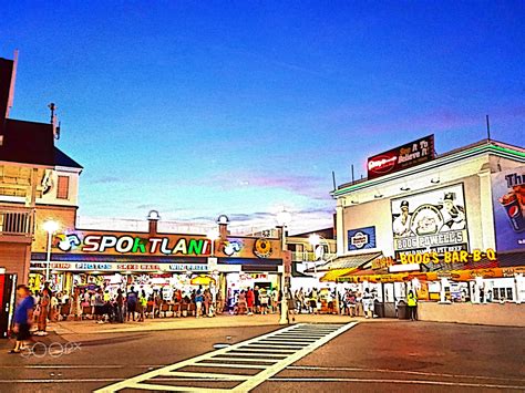 View of the boardwalk from the pier | Ocean city maryland, Ocean city, Boardwalk