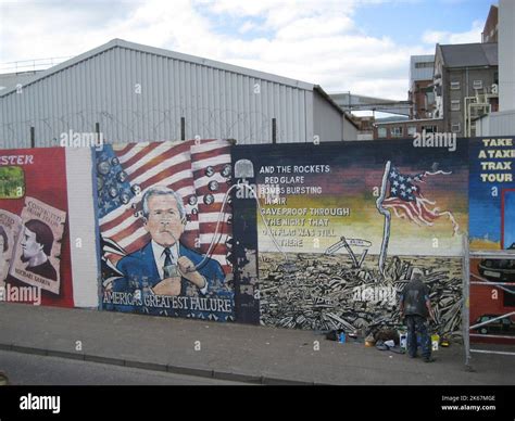 The Peace wall with painted murals in Belfast, Northern Ireland Stock ...