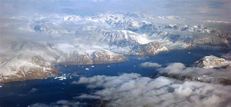 Summer icebergs in the arctic Greenland Photograph by Pierre Leclerc Photography - Pixels