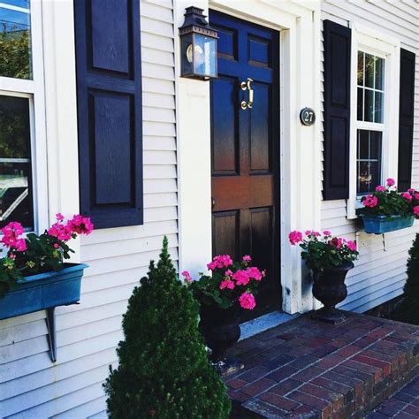 Omg this house is so cute! The black shutters make the white pop and so do the hot… | Exterior ...