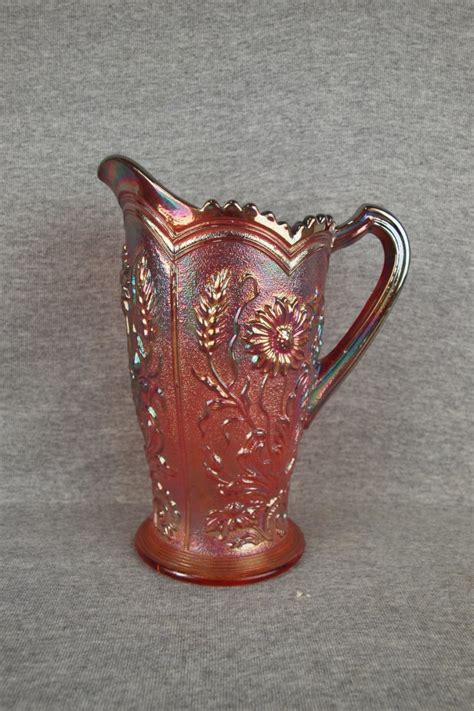 Imperial red carnival glass field flower water pitcher - Sep 26, 2013 | Strawser Auction Group in IN