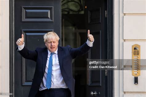 Newly elected Conservative party leader Boris Johnson poses outside ...