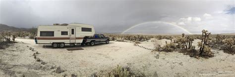 A rainbow appears while camping at Mountain Palm Springs Campground in Anza Borrego Desert State ...