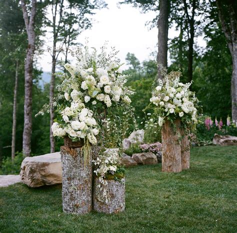 Rustic Wood and Overgrown White Floral Wedding Altar Decor