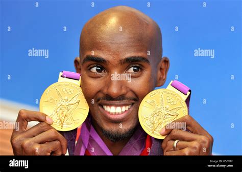 Great Britain's Mo Farah with his 2 Olympic gold medals he won in the ...