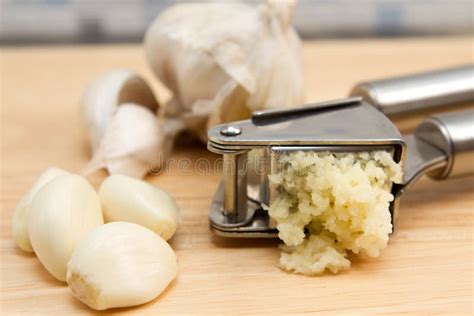 Crushed Garlic Clove stock photo. Image of chrome, image - 33623262