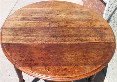 Early 19th Century Round Rustic Drop-Leaf Table at 1stDibs