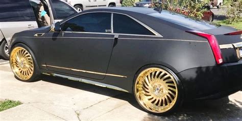 Ace-1: Matte Black Cadillac CTS Coupe on Gold 26"s FS02 Asantis